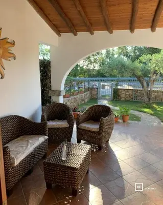 Area soggiorno di BeLocations - Villa a San Teodoro con piscina privata