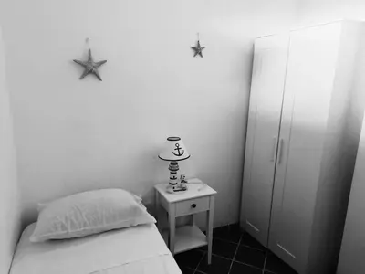 Letto o letti in una camera di HH San Teodoro - Four-room Sea View - Unit A