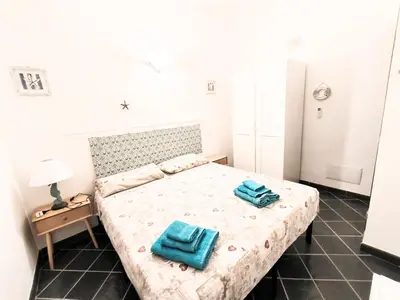 Letto o letti in una camera di HH San Teodoro - Four-room Sea View - Unit A
