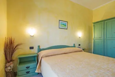 Letto o letti in una camera di Hotel Gli Ontani