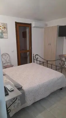 Letto o letti in una camera di Casa Grazia Deledda 16