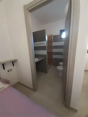 Letto o letti in una camera di Casa Grazia Deledda 16