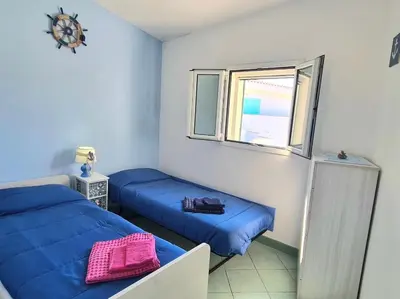 Letto o letti in una camera di Amazing view fronte mare