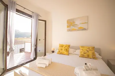 Letto o letti in una camera di CNC Vacanze Sardegna