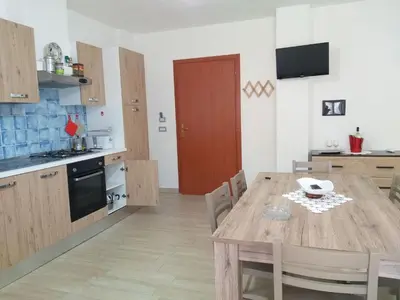 Cucina o angolo cottura di Apartment Golf von Orosei - Irgoli by Interhome