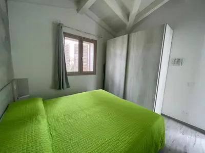 Letto o letti in una camera di Villetta Maluva - Budoni