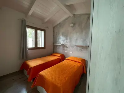 Letto o letti in una camera di Villetta Maluva - Budoni