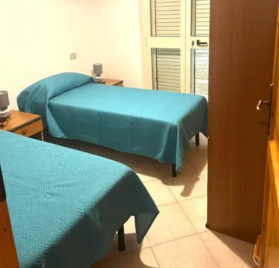 Letto o letti in una camera di Casa Vacanze Da Rita