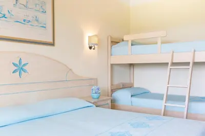 Letto o letti in una camera di Hotel Marina Garden
