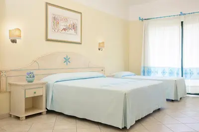 Letto o letti in una camera di Hotel Marina Garden