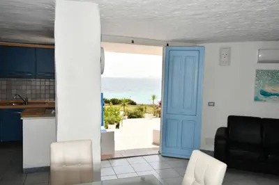 Area soggiorno di Appartamento sulla spiaggia indipendente