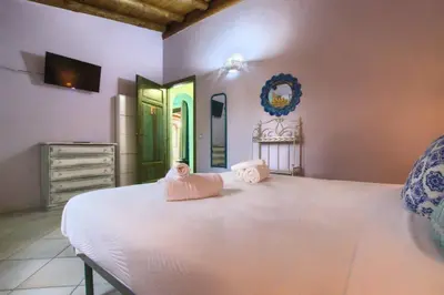 Letto o letti in una camera di Villa Raja - 5 min dalla spiaggia - con parcheggio