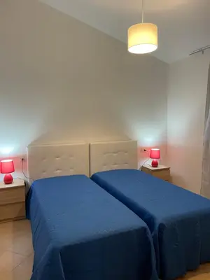 Letto o letti in una camera di Case Vacanze Cielo e Celeste