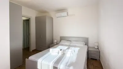 Letto o letti in una camera di Pittulongu Horizon