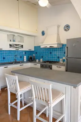Cucina o angolo cottura di Villa Baia Salinedda
