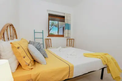 Letto o letti in una camera di La Casa di Giuliano Salina Bamba San Teodoro