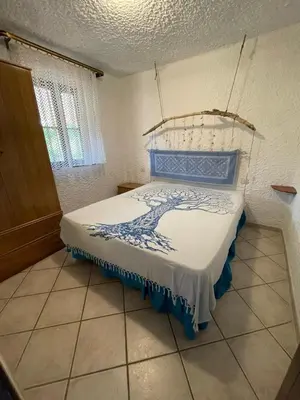 Letto o letti in una camera di villa lucia