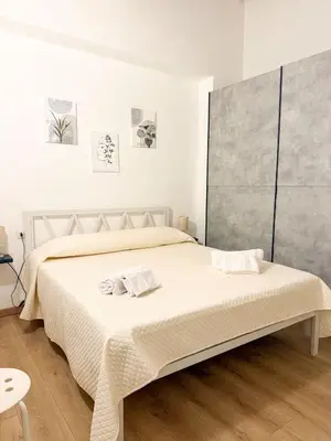 Letto o letti in una camera di Appartamento Olbia Centro