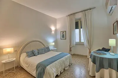 Letto o letti in una camera di Orange Home