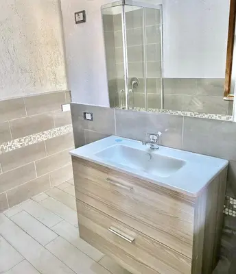 Bagno di Apartment 3 beds ground floor with garden in Marinella just 100 mt from the beach