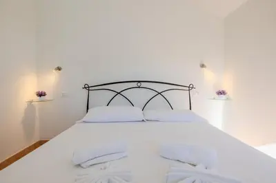 Letto o letti in una camera di La casa al mare- AD GROUP