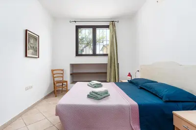 Letto o letti in una camera di Su Nidu Virde