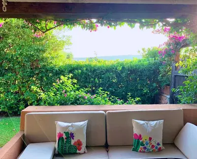 Giardino di Apartment 3 bedrooms, 2 bathrooms in Marinella just 70 mt from the sea