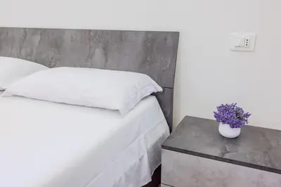 Letto o letti in una camera di The house by the sea- AD GROUP
