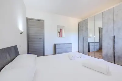 Letto o letti in una camera di The house by the sea- AD GROUP