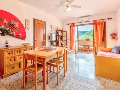 Area soggiorno di Apartment 5 beds in Marinella just 300 mt from the sea