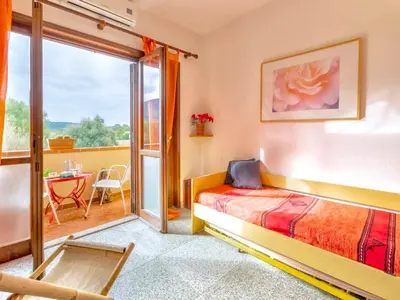 Letto o letti in una camera di Apartment 5 beds in Marinella just 300 mt from the sea