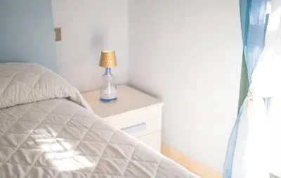 Letto o letti in una camera di Villa Stella Maris