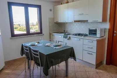 Cucina o angolo cottura di YAYA appartamenti vacanza