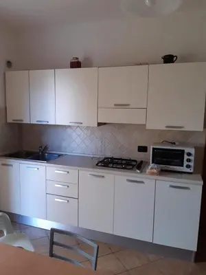 Cucina o angolo cottura di YAYA appartamenti vacanza