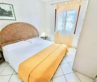Letto o letti in una camera di Apartment 6 beds in Marinella with SEA VIEW