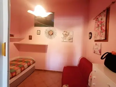 Letto o letti in una camera di Sweet House
