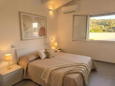 Letto o letti in una camera di Apartment Sutt'e Riu by Interhome