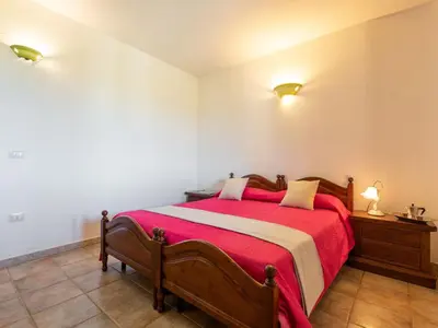 Letto o letti in una camera di Apartment Pompia-2 by Interhome