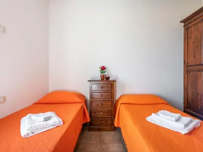 Letto o letti in una camera di Apartment Pompia-2 by Interhome