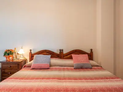 Letto o letti in una camera di Apartment Pompia-6 by Interhome