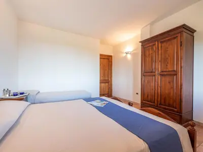 Letto o letti in una camera di Apartment Pompia-6 by Interhome