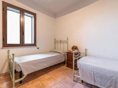 Letto o letti in una camera di Apartment Pompia-6 by Interhome