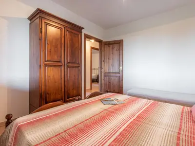 Letto o letti in una camera di Apartment Pompia-6 by Interhome