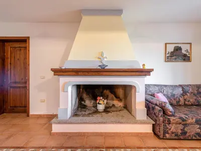 Area soggiorno di Apartment Pompia-5 by Interhome