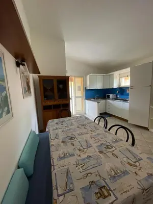 Letto o letti in una camera di Porto Ottiolu House