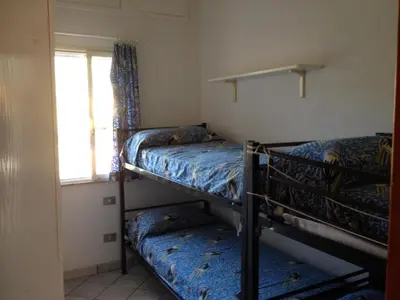 Letto o letti in una camera di Porto Ottiolu House