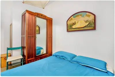 Letto o letti in una camera di Villa Sulas
