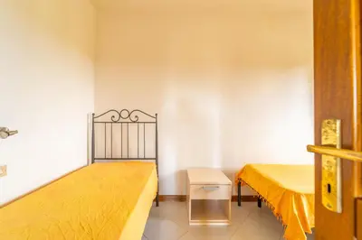 Letto o letti in una camera di ISS Travel, Residence Pedra Rosa