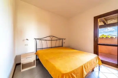Letto o letti in una camera di ISS Travel, Residence Pedra Rosa