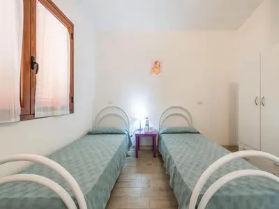 Letto o letti in una camera di Bright detached villa in Capo Comino
